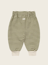 將圖片載入圖庫檢視器 Green and beige striped baby pants on a light beige background