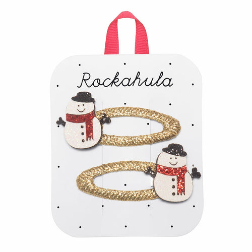 Snowman-themed hair tie packaging with 'Rockahula' branding on a white background