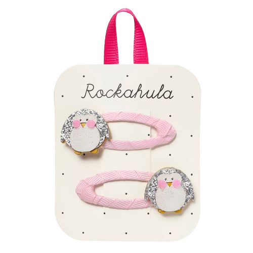 Set of penguin-themed hair clips on a Rockahula branded card.