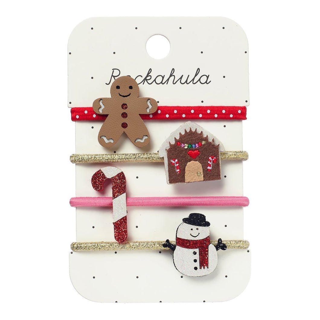 Set of Christmas-themed hair elastics on a 'Rockahula' branded card.