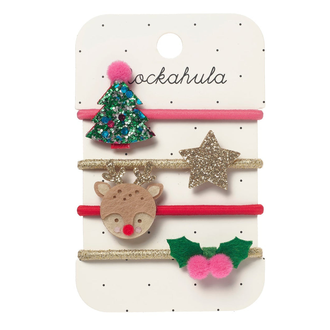 Set of Christmas-themed hair accessories on a white card with 'ockahula' branding.