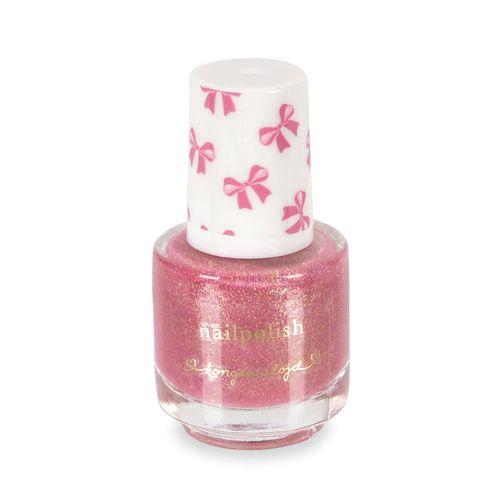 Pink nail polish bottle with decorative cap on a white background