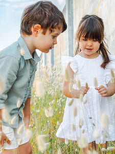 Dress embroidered flowers with bow on the back
