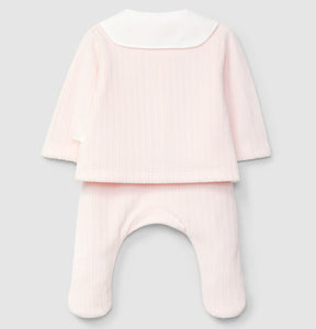 Pink baby outfit with top and pants on a light gray background