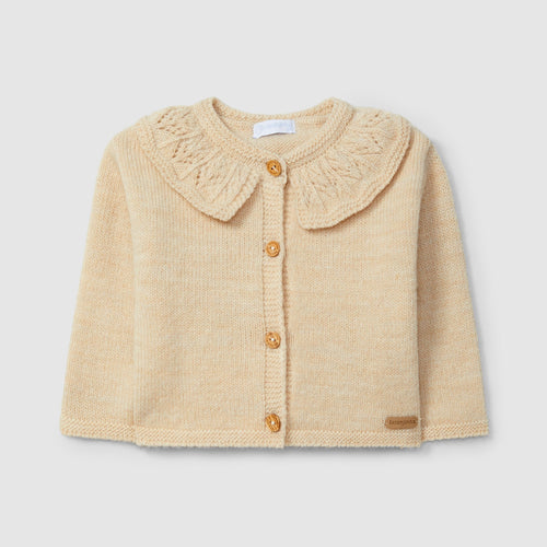 Beige baby jacket with lace collar on a light gray background