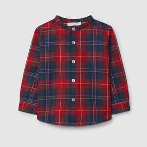 Red and blue plaid shirt on a light gray background