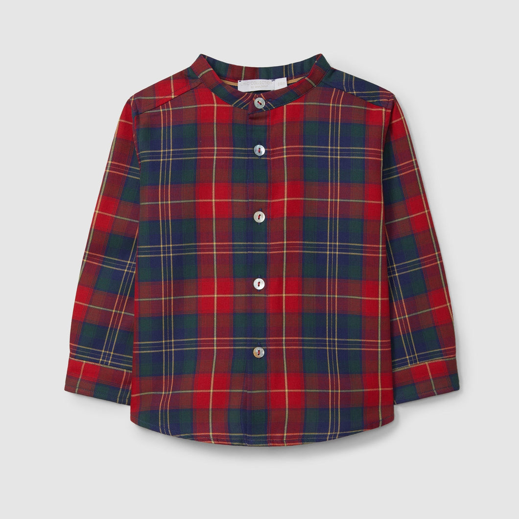 Red and blue plaid shirt on a light gray background