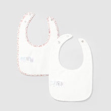 Load image into Gallery viewer, Two baby bibs with floral trim on a light gray background
