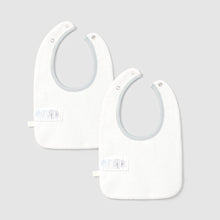Load image into Gallery viewer, Two white baby bibs on a light gray background