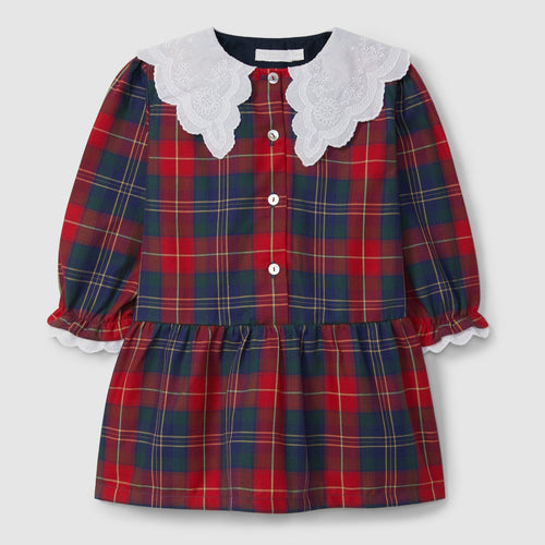Red and blue plaid dress with lace collar on a light gray background
