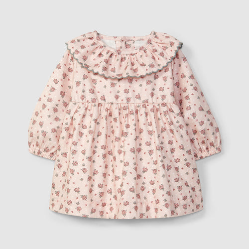 Floral-patterned dress on a light gray background