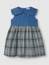 Load image into Gallery viewer, Laranjinha check denim dress in indigo with long sleeves and button-front design, styled casually on a hanger.