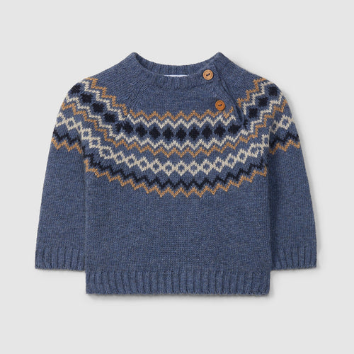 Blue knitted sweater with a pattern on a light gray background