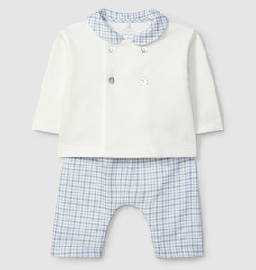 Baby outfit with white shirt and blue checkered pants on a light gray background