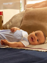 Load image into Gallery viewer, Laranjinha striped two-in-one seersucker romper in indigo, featuring a stylish design with vertical and horizontal stripes.
