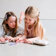 Load image into Gallery viewer, Pink Easter pouch headband by MIMI &amp; LULA featuring soft fabric and festive design for holiday celebrations.