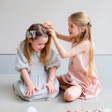 Load image into Gallery viewer, Pink Easter pouch headband by MIMI &amp; LULA featuring soft fabric and adorable design, perfect for spring celebrations.