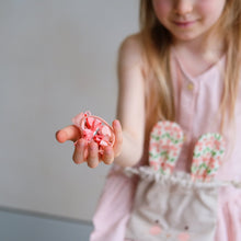 Load image into Gallery viewer, Pink Easter pouch headband by MIMI &amp; LULA featuring soft fabric and playful design, perfect for festive spring accessories.