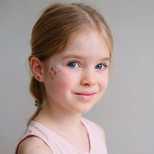 Load image into Gallery viewer, Easter stick-on earrings attached to a headband, featuring colorful, festive designs from MIMI &amp; LULA for holiday celebrations.