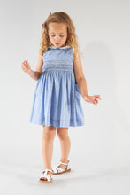 Load image into Gallery viewer, Kidiwi Ixia smocked dress in two-tone porcelain blue with plumetis pattern, featuring delicate fabric and elegant design.