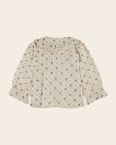 Ecru blouse with blue flowers