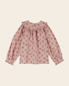 Pink blouse with red flowers