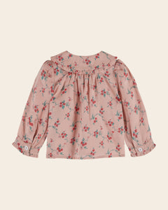 Pink blouse with red flowers