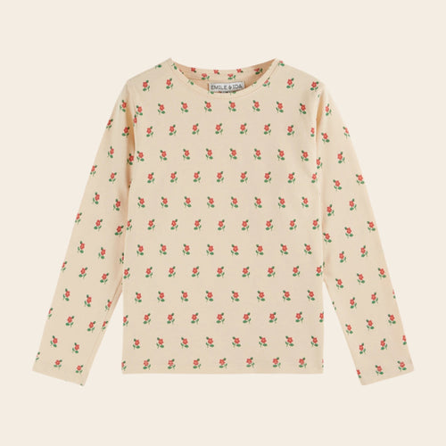 Long-sleeve shirt with floral pattern on a beige background