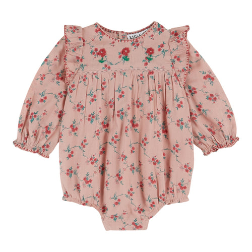 Pink floral baby romper on a white background