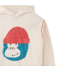 Load image into Gallery viewer, Beige hoodie with a cartoon monkey design on a white background