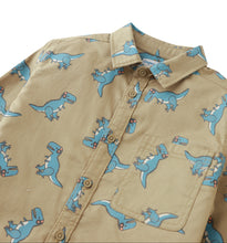 Load image into Gallery viewer, Beige shirt with blue dinosaur pattern on a white background