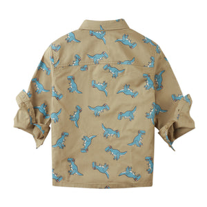 Beige shirt with blue dinosaur patterns on a white background