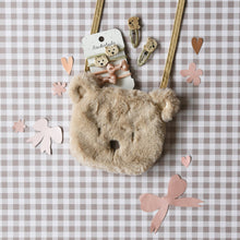 Load image into Gallery viewer, Pink teddy bear-shaped handbag by Rockahula Kids, featuring soft plush fabric and cute bear face design.