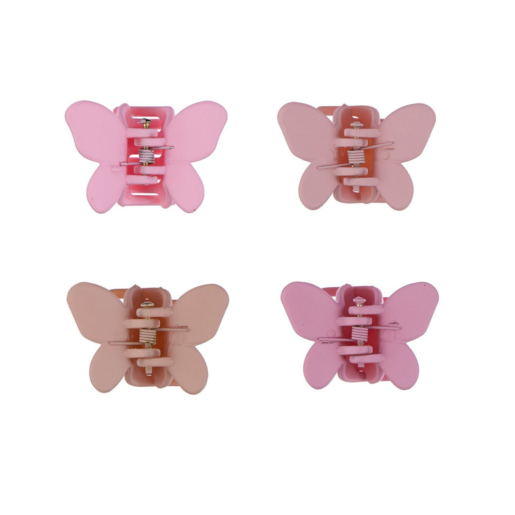 Four pink butterfly-shaped hair clips on a white background