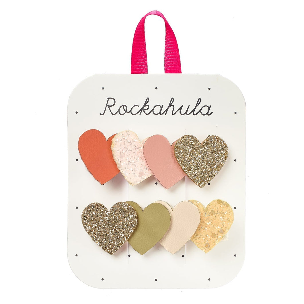 Set of heart-shaped hair clips on a Rockahula branded card.