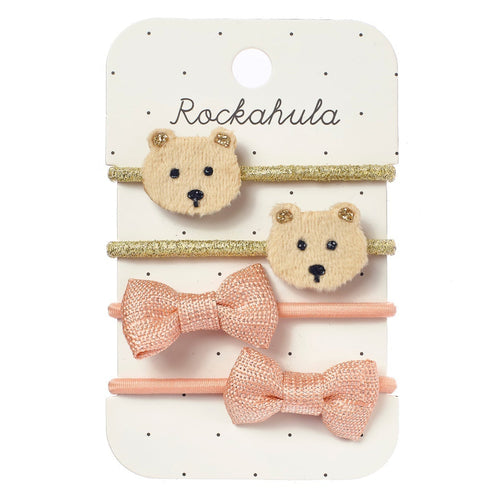 Set of bear-shaped hair clips and pink bow hair ties on a Rockahula branded card.