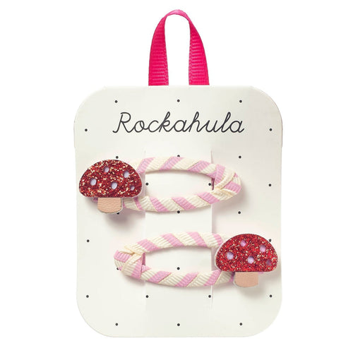 Set of mushroom-shaped hair clips on a Rockahula branded card with pink handle.