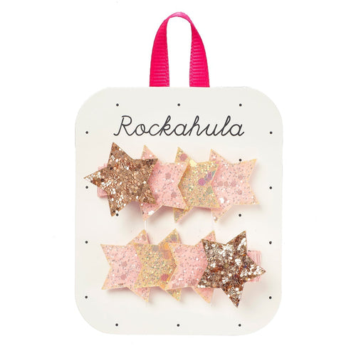 Star-shaped hair clips on a Rockahula branded card with a pink handle.