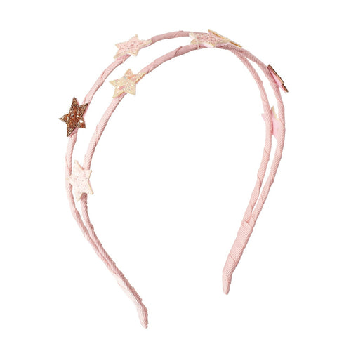Pink headband with star-shaped decorations on a white background