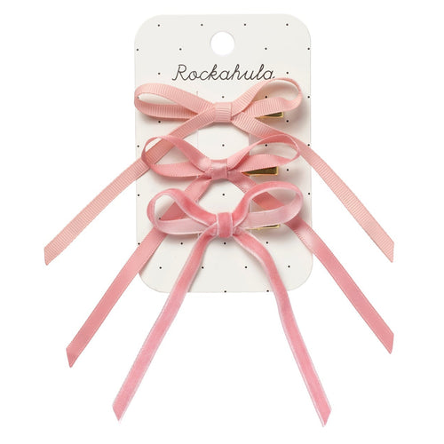 Set of pink hair bows on a Rockahula branded card against a white background