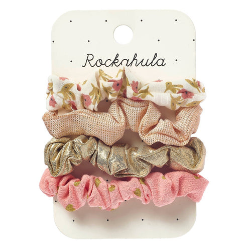 Set of floral and patterned scrunchies on a Rockahula branded card.
