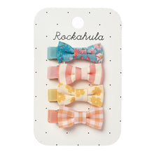 Load image into Gallery viewer, Set of colorful hair bows on a Rockahula branded card