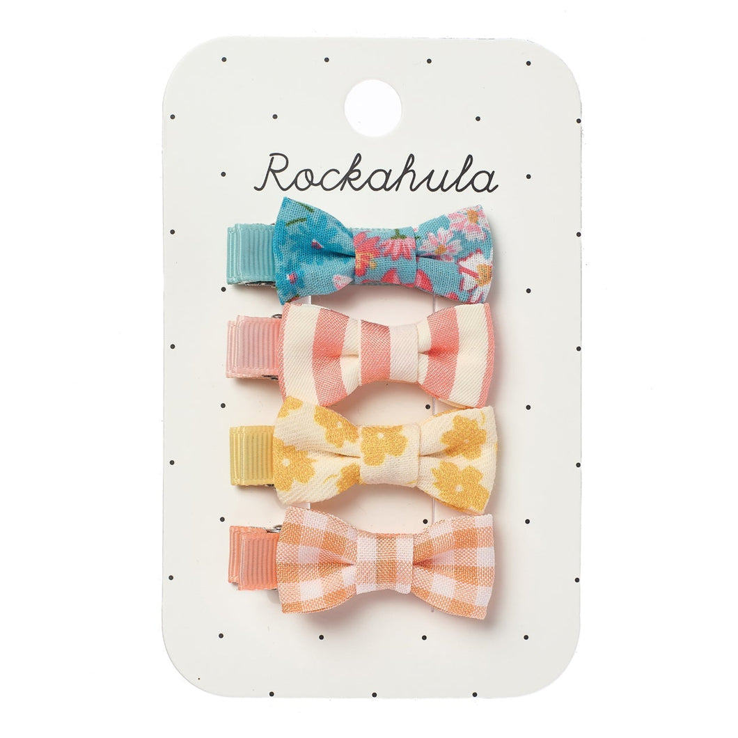 Set of colorful hair bows on a Rockahula branded card