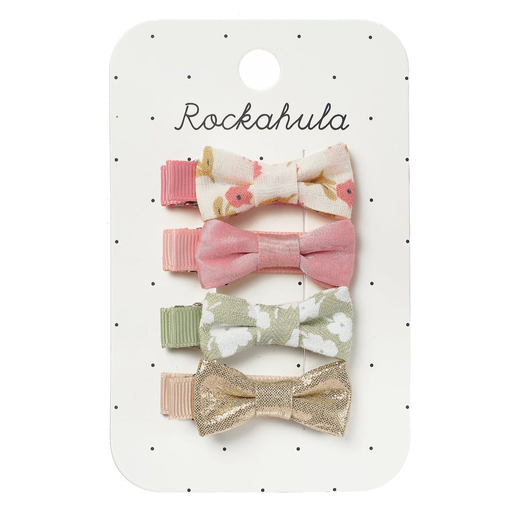 Set of five floral hair clips on a Rockahula branded card.