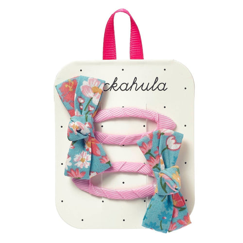 Set of hair accessories including bows and ribbons on a branded card with 'ckahula' branding.