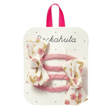 Load image into Gallery viewer, Set of hair ties with floral design on a branded card