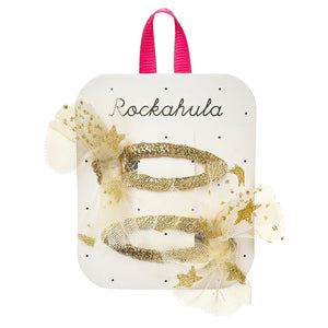 Packaged hair accessories with 'Rockahula' branding on a white background
