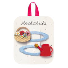 Load image into Gallery viewer, Set of hair clips on a 'Rockahula' branded card with a pink handle.