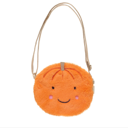 Orange plush bag with a smiley face on a white background