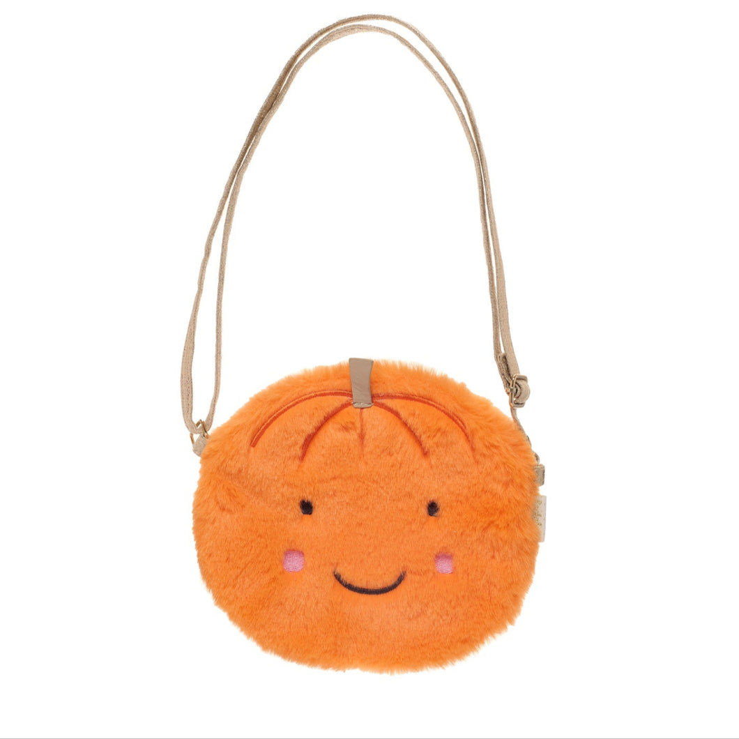 Orange plush bag with a smiley face on a white background